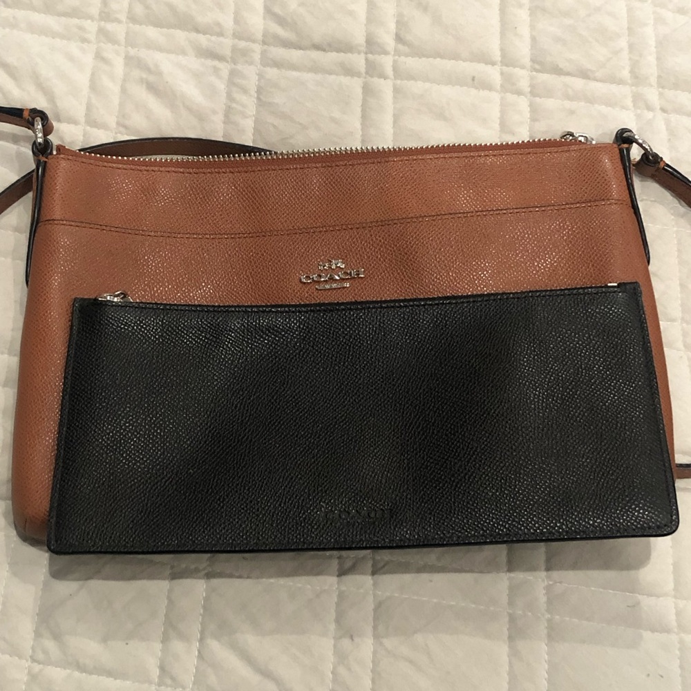 Like new in good condition Coach crossbody in brown with silver hardware